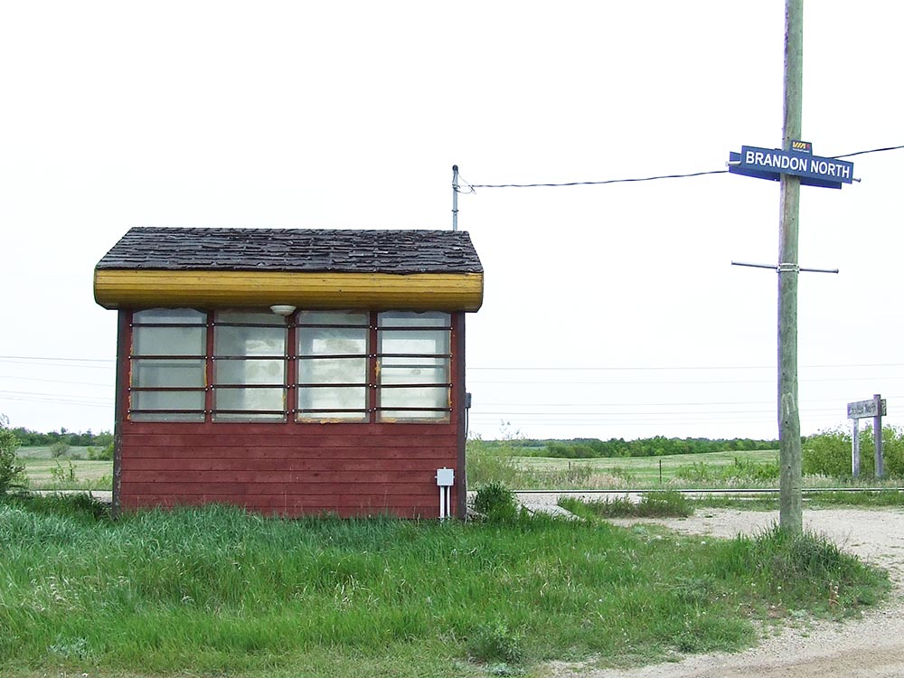 Brandon North VIA Rail stationette in its original location north of Brandon, Manitoba