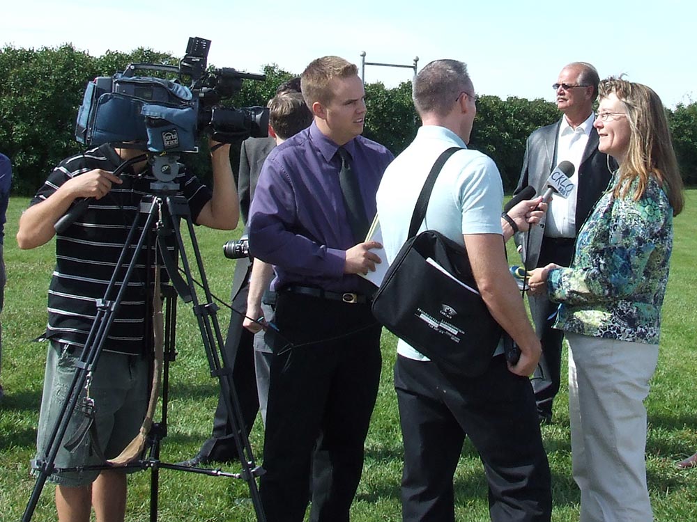 A television news crew interviews Rivers Train Station Restoration Committee volunteers on the September 9, 2009, during the opening day for the Rivers Train Station stationette